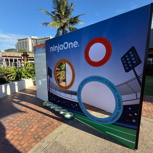 Promotional display with circular cutouts.