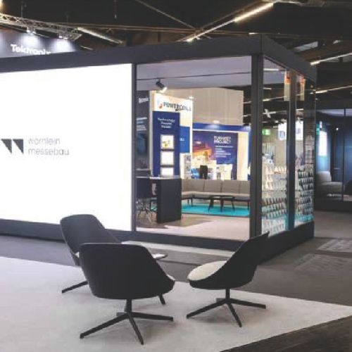 Modern exhibition space with seating area